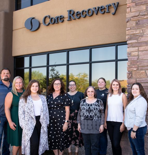 Core Recovery staff in front of their office team